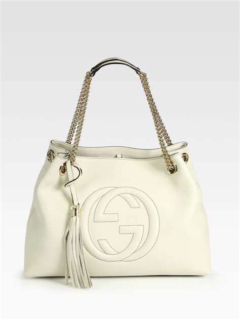 gucci ceket|white gucci bag.